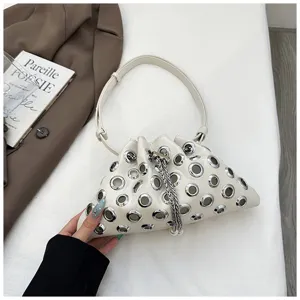 Chic white grommet shoulder bag with metallic eyelets and chain drawstring closure for women