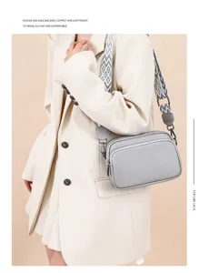 Grey litchi pattern women crossbody bag, stylish small square bag with geometric strap.