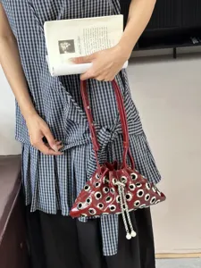 Dark red metallic grommet bucket bag stylish shoulder crossbody handbag with chains