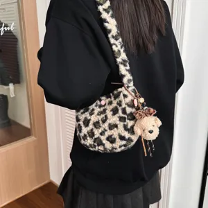 Retro leopard print lamb wool crossbody bag with cute plush puppy charm, soft and chic detail.