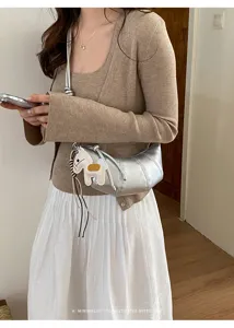 Minimalist silver croissant sling bag for women daily commute stylish crossbody dumpling purse