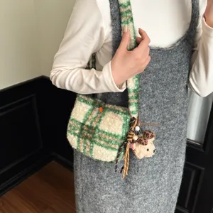 Winter green plaid shearling crossbody bag with cute bear charm for daily casual styles.