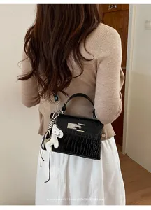 Elegant black crocodile pattern women handbag, classic kelly tote bag with metal lock.