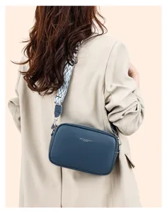 Stylish leather crossbody bag for women with wide strap, perfect for daily casual wear.
