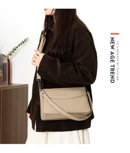 Genuine leather shoulder crossbody bag for women, stylish daily handbag with flap design.