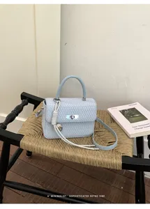 Elegante bolso de hombro tejido para mujer, bolso de mano de moda con asa superior.