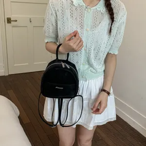 Stylish black mini backpack for women, casual lightweight small daypack for daily wear.