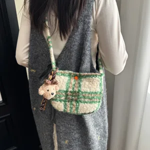 Winter women woolen plaid crossbody bag with cute plush bear pendant, retro fuzzy shoulder bag.