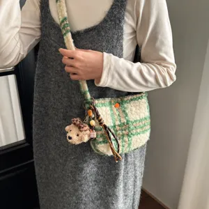 Winter vintage plaid sherpa crossbody bag for women, cozy plush shoulder handbag.
