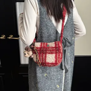 Winter retro plaid lamb wool crossbody bag for women, stylish plush shoulder handbag.