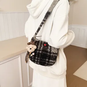 Plush plaid crossbody bag with cute bear charm, retro lamb wool shoulder handbag for women.