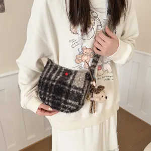 Fuzzy plaid crossbody bag for women, retro wool half-moon shoulder bag with cute bear pendant.
