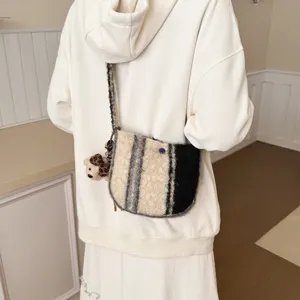 Winter retro lamb wool plaid crossbody bag for women, stylish semi-circular woolen handbag.