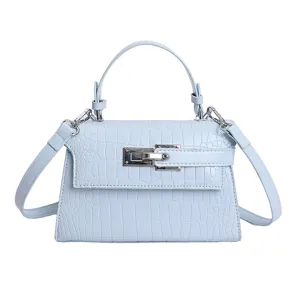 Light blue crocodile pattern leather Kelly handbag, stylish women's shoulder bag with hardware.