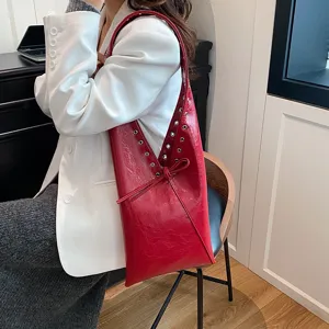 Red oil wax leather shoulder hobo bag with metal rivet details fashion women handbag.