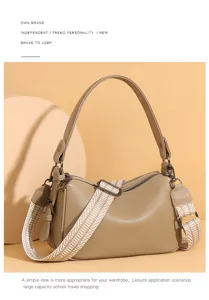 Detailed view of the genuine leather shoulder bag featuring a wide strap and soft texture.