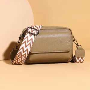 Genuine leather crossbody bag with wide geometric strap, chic casual shoulder bag for women.