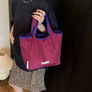 Casual folding tote bag for women with blue contrast trim and stylish daily use design
