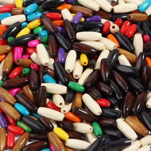 Wooden beads bulk detail showing various colors and oval shapes for jewelry making and DIY crafts