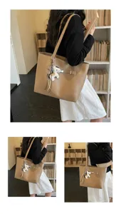 Casual large capacity tote bag for women, stylish commuting shoulder bag with cute horse charm.