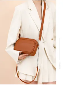 Retro brown leather crossbody bag with chain strap, stylish soft cowhide camera bag for women