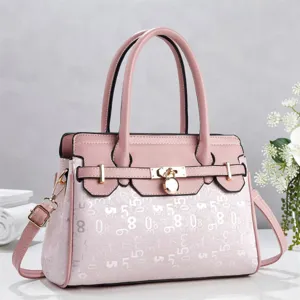Pink faux leather tote bag with stylish lock closure and unique digital print for women daily.