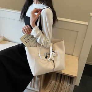 Stylish minimalist large capacity tote bag for women, versatile PU leather shoulder bag with chic charm.