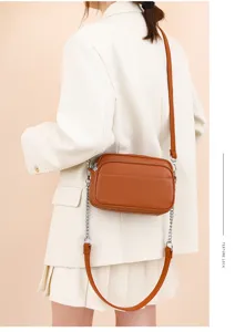 Vintage genuine leather shoulder bag for women, soft cowhide crossbody bag with chain.