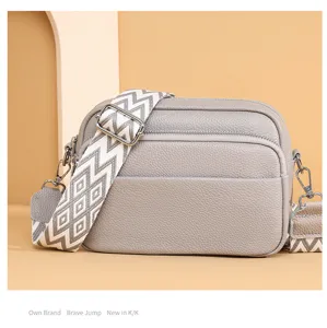 Stylish multi-layer grey crossbody bag with wide geometric strap for women daily commute