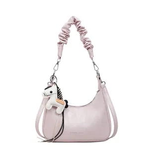 Stylish pink hobo shoulder bag with scrunchie handle and cute horse charm for daily use