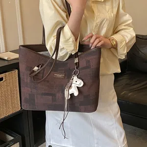 Borsa shopper chic da donna con ciondolo cavallo, grande borsa a spalla casual ed elegante.