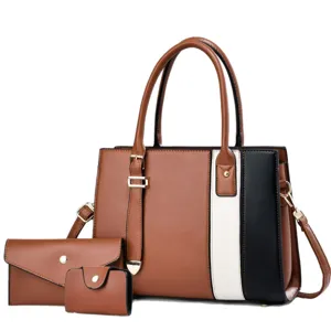 Chic color-block tote handbag set with matching wallet and crossbody strap for women.