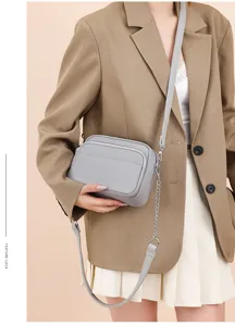 Genuine leather retro soft crossbody bag with chain strap, versatile grey camera bag.