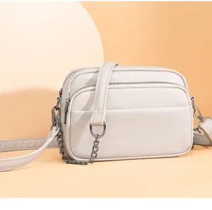 Genuine leather crossbody bag detail, soft retro shoulder purse with metal chain strap.