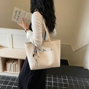 Beige large capacity tote bag for women, stylish casual commuting shoulder bag with chic lock.