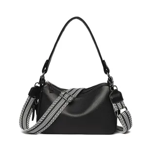 Genuine leather women shoulder crossbody bag, stylish black saddle pillow bag with wide strap.
