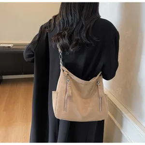 Detailed view of vintage style tote shoulder bag, PU leather, casual daily underarm bag.