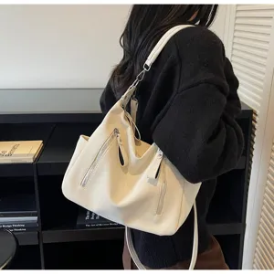 Retro fashion large-capacity tote bag for women, premium leather casual shoulder bag.