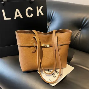 Brown litchi grain leather tote bag for women, stylish large capacity commuting shoulder bag.