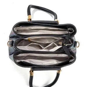 Multi-compartment structured tote bag with laser snakeskin texture and gold hardware.