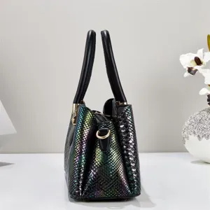 Close-up detail view of the holographic snakeskin textured tote bag with premium metal hardware.