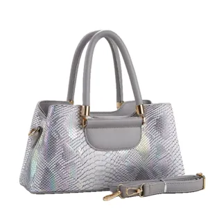 Stylish laser snake-skin textured tote bag with top handles and shoulder strap for daily commuting.