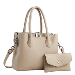 Elegante beige lederen handtas met bijpassende clutch, grote casual schoudertas voor dames.