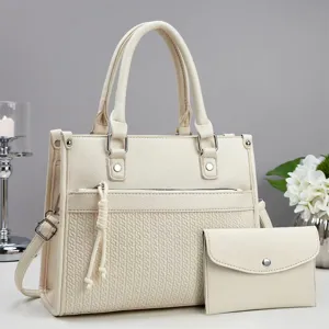 Chic white women handbag set with textured leather, top handle, and matching clutch bag.