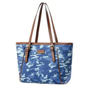 Blue camouflage women tote shoulder bag with brown leather trim and dual handles for daily commute.