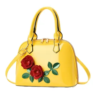 Yellow patent leather shoulder bag with 3d rose flower decor, stylish dome handbag for women.