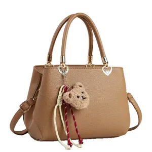 Stylish brown handbag with cute plush bear pendant, top handle daily commuter women bag