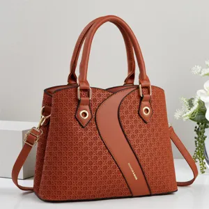 Stylish brown woven texture contrast panel handbag with top handles and shoulder strap.