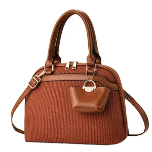Brown dome crossbody bag for women with stylish pleated texture and top handle design