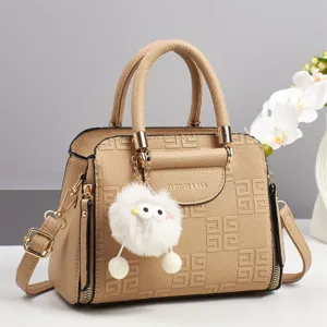 Stylish khaki shoulder handbag for women, large capacity top handle bag with cute plush charm.